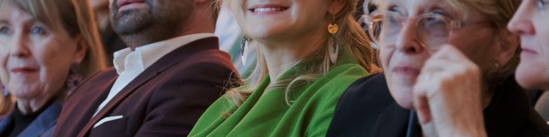 Grand Duchess Stephanie of Luxembourg smiling in a vivid green dress in the audience at the Edward Steichen Awards 2026 ceremony at MUDAM Luxembourg - Photo: Maison du Grand-Duc / Pancake! Photographie