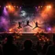 Halloween-Spektakel auf der Buehne von Michael Jackson ONE in Las Vegas: Artisten als Silhouetten vor orange-violettem Licht und Kuerbislaternen.